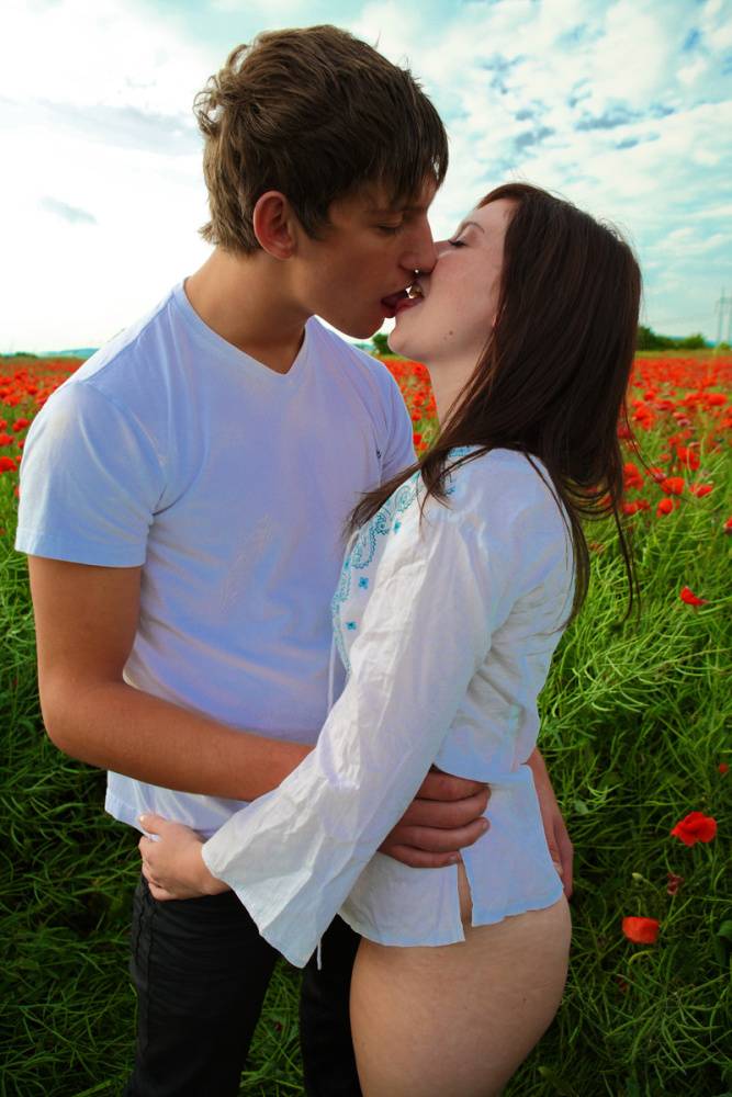 Young girl and her boyfriend have sex in a field of blooming poppies - #14