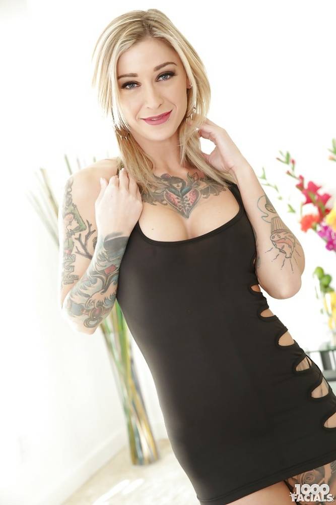Inked blonde babe Kleio Valentien freeing big tits and ass from dress - #7