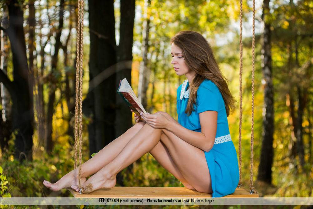 Leggy teen Mary Kalisy puts away a book before posing nude on a rope swing - #3