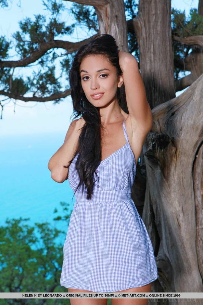 Dark haired Ukrainian teen Helen H gets totally next to a weathered tree - #12