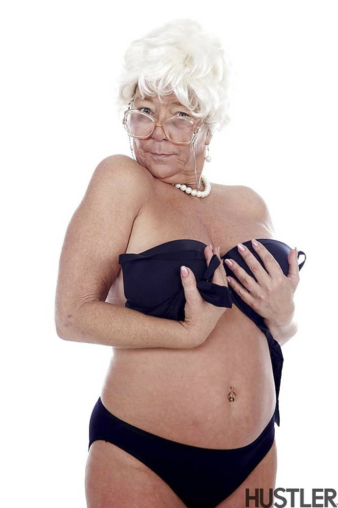 Granny pornstar Karen Summer modelling fully clothed before stripping naked - #6