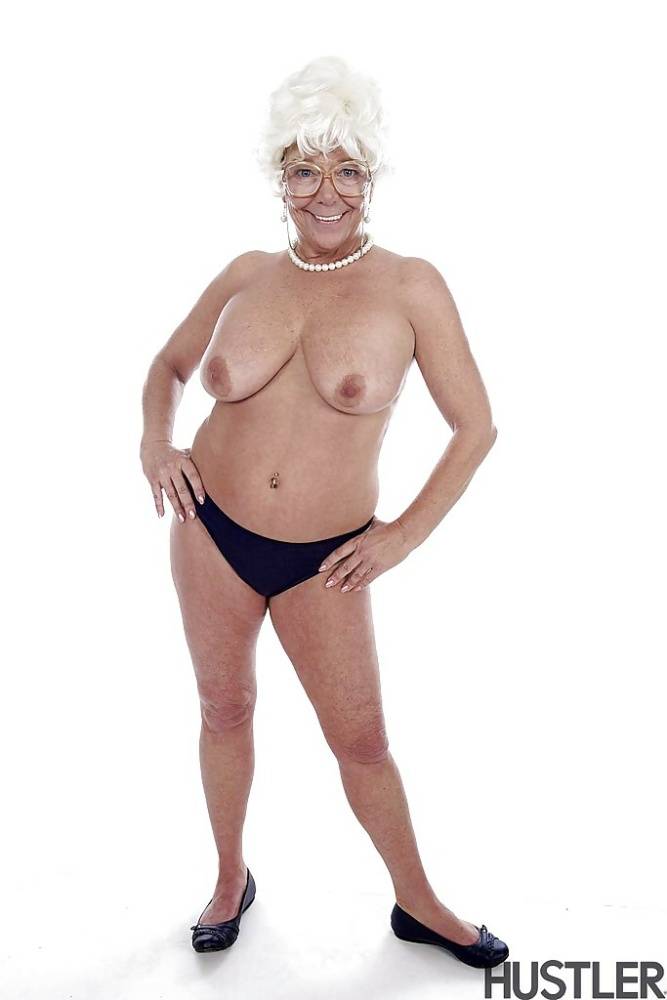 Granny pornstar Karen Summer modelling fully clothed before stripping naked - #1