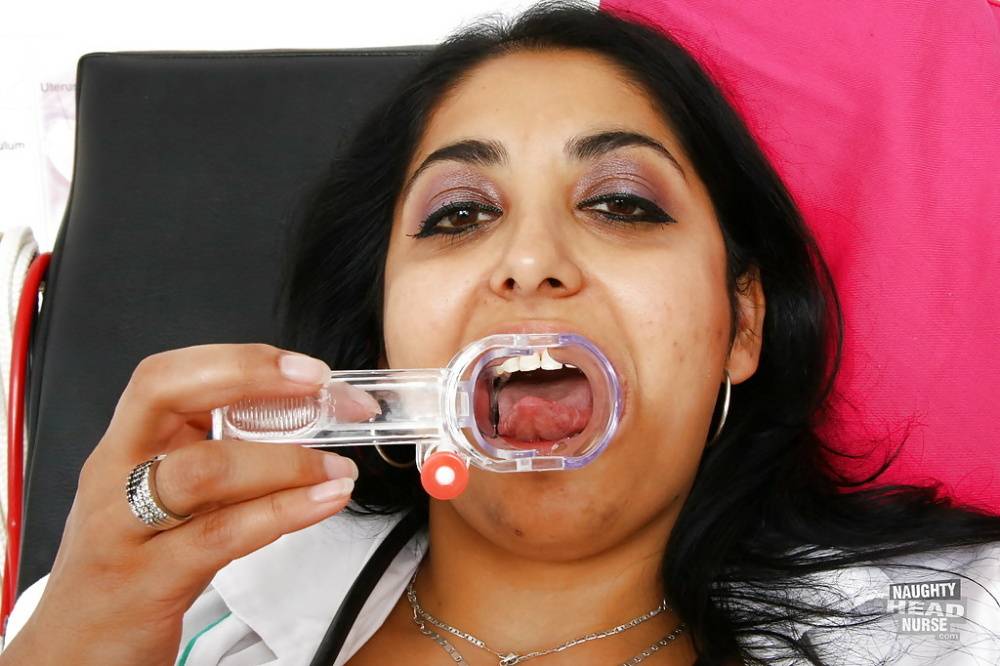Aged Indian woman Alice using a speculum on her pussy in hospital - #12