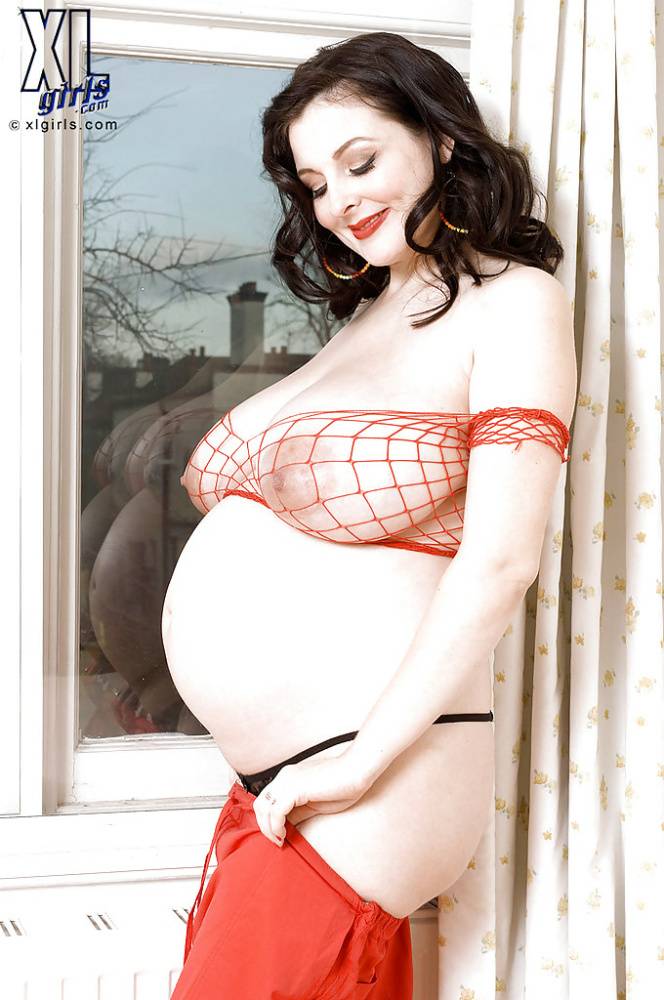 Brunette preggo with fat tits Lorna Morgan posing in fishnet bra and black panties - #3