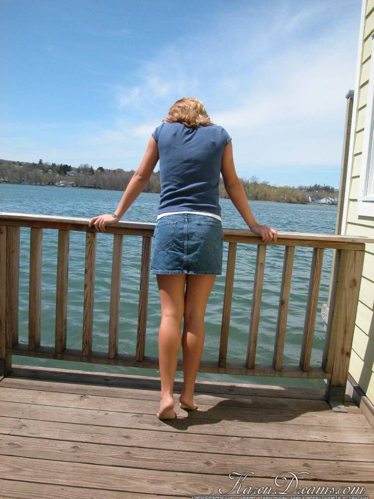 Blonde solo girl flashes upskirt panties on lakeside boardwalk - #9