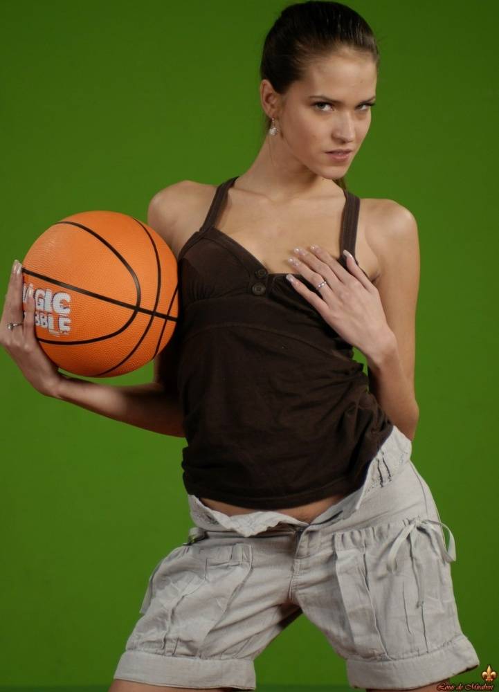 Solo girl Silvie Deluxe plays with a basketball while showing her firm tits - #11