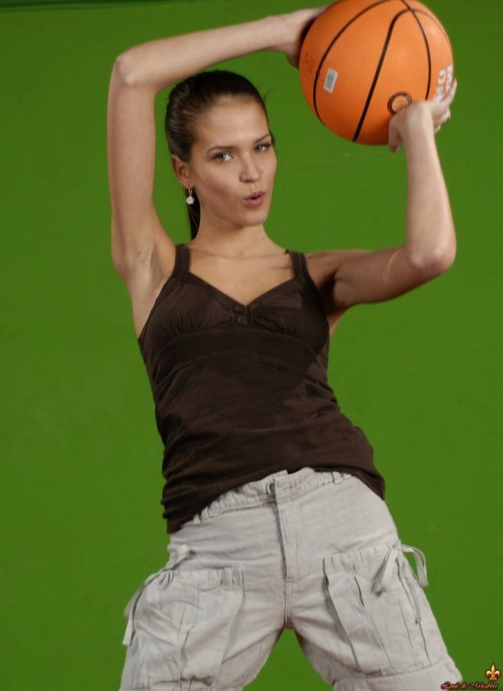 Solo girl Silvie Deluxe plays with a basketball while showing her firm tits - #12