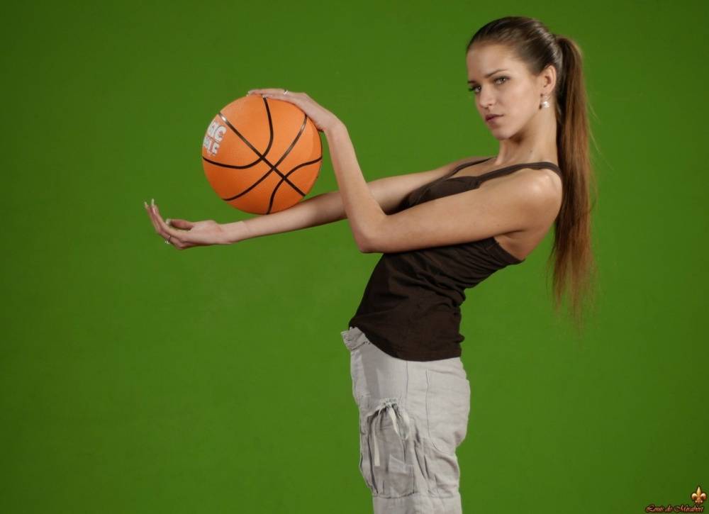 Solo girl Silvie Deluxe plays with a basketball while showing her firm tits - #16
