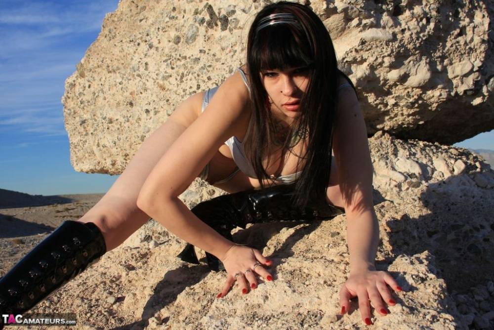 Amateur model Susy Rocks crawls on a boulder in a swimsuit and black boots - #1