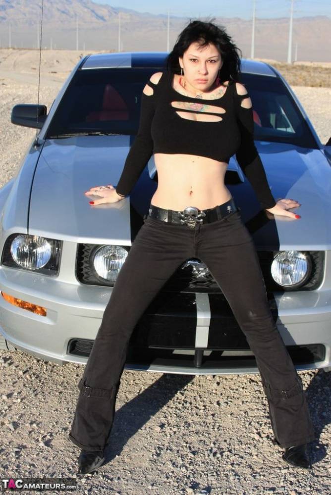 Sexy chick Susy Rocks exposes her bra over the hood of a car in shades - #3