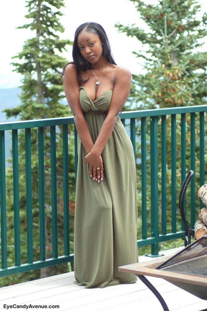 Ebony amateur Amber releases her big tits from a long dress on a balcony - #3