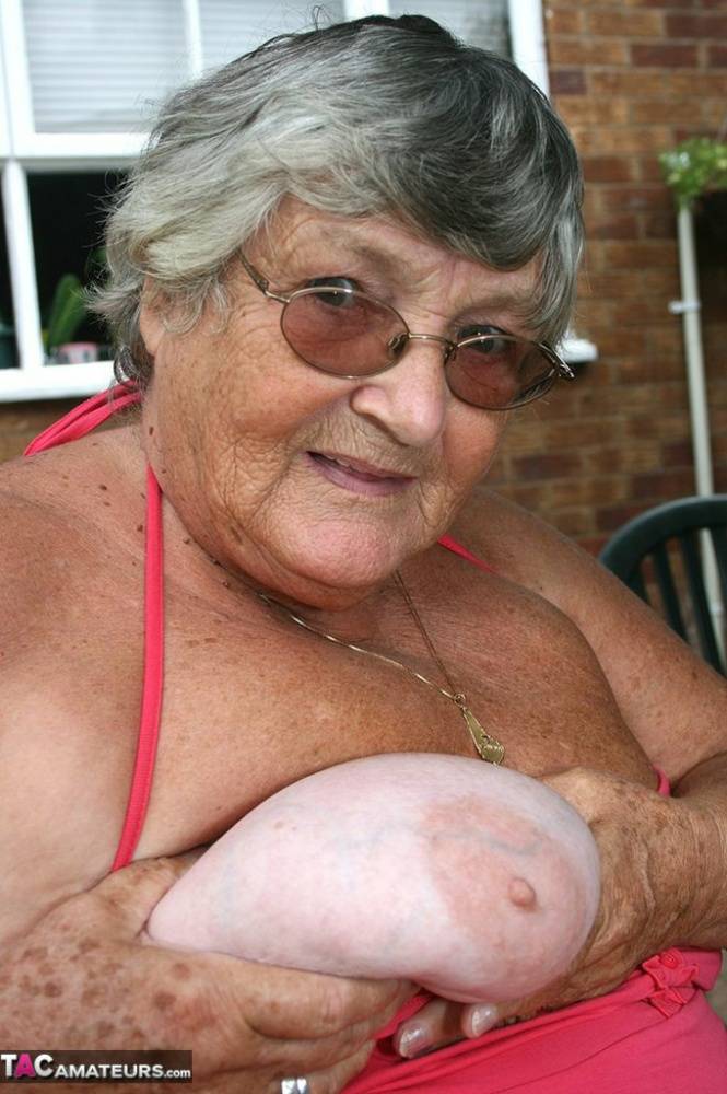 Fat oma Grandma Libby licks a nipple before baring her big ass on a patio | Photo: 732854