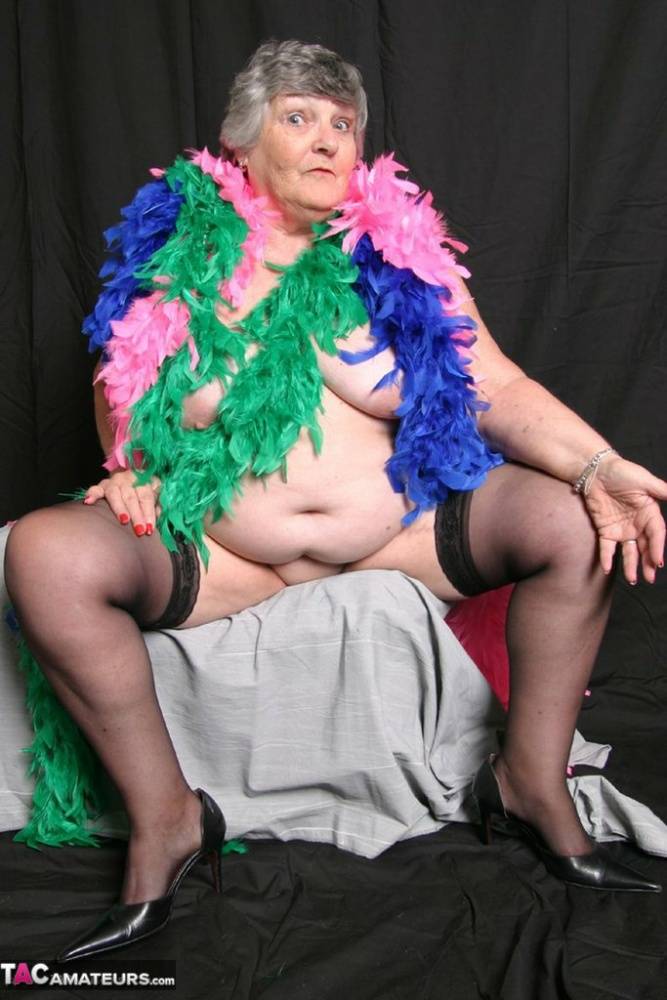 Fat UK amateur Grandma Libby shows her big tits while draped in feather boas - #6