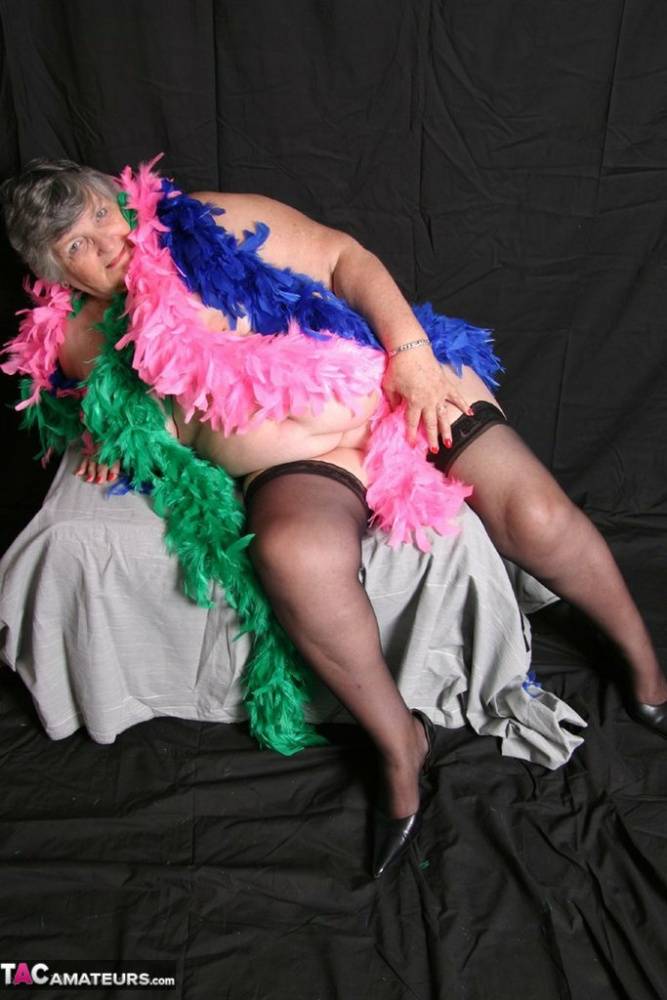 Fat UK amateur Grandma Libby shows her big tits while draped in feather boas - #7