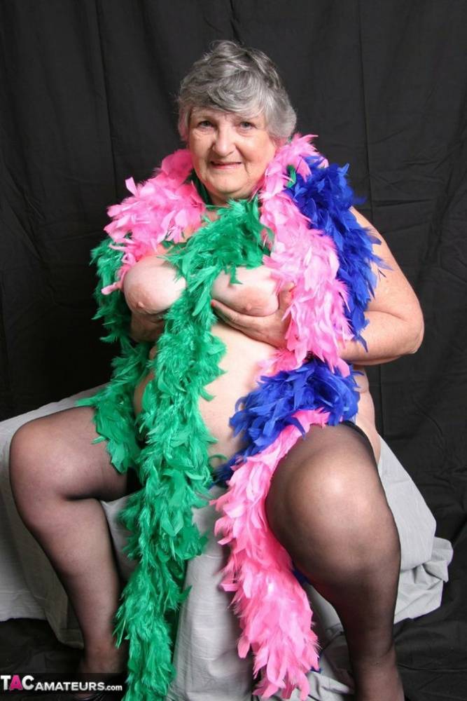 Fat UK amateur Grandma Libby shows her big tits while draped in feather boas - #16