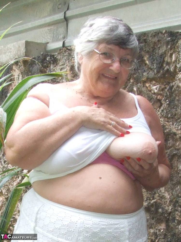 Obese British lady Grandma Libby exposes her large tits underneath a tree - #12
