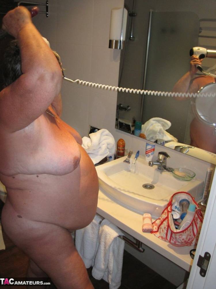 Obese amateur Grandma Libby blow drys her hair after taking a shower - #9