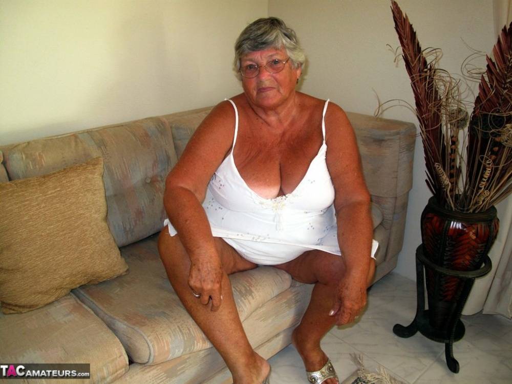 Fat lady Grandma Libby bares her saggy tits and big ass while on a couch - #10