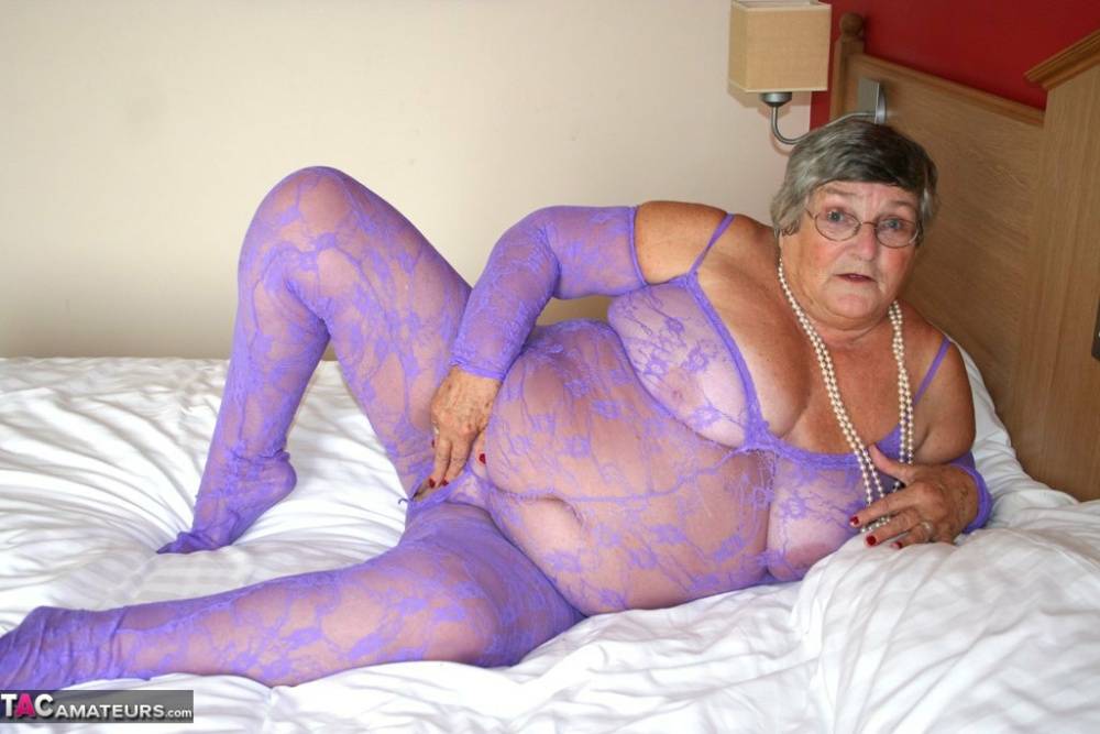 British fatty Grandma Libby masturbates on a bed in a crotchless bodystocking - #8