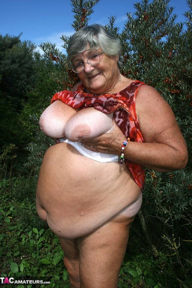 Obese nan Grandma Libby strips totally naked out by evergreen trees - #5