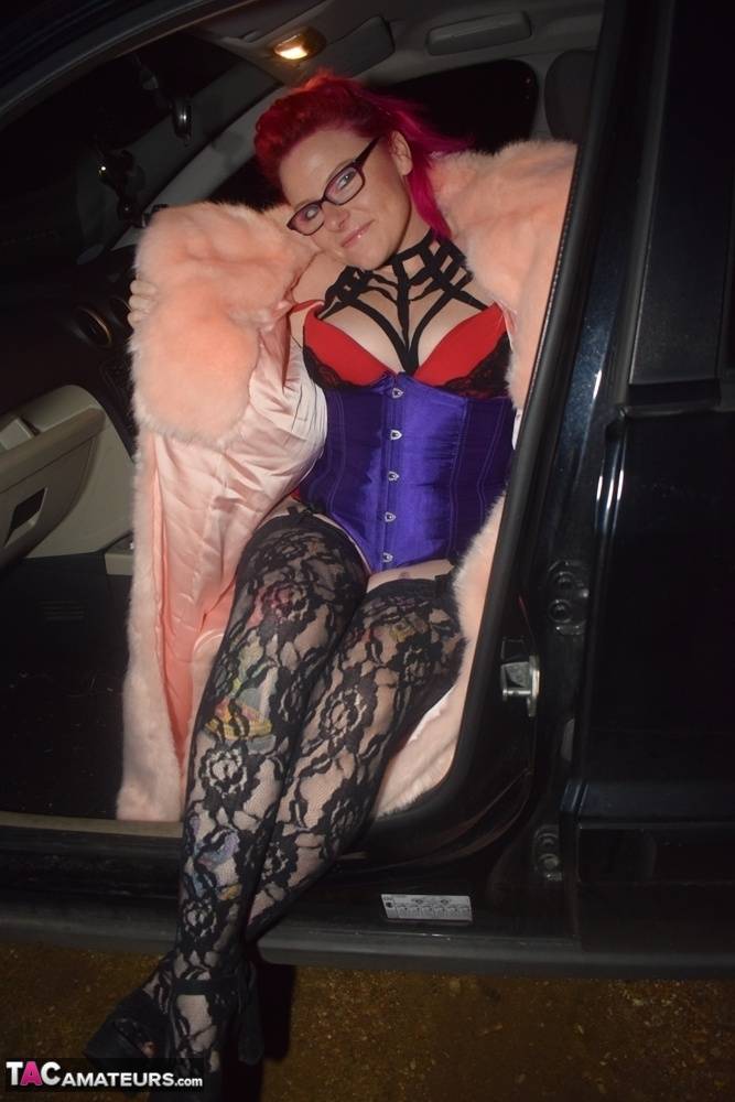 Amateur chick with dyed hair steps out of a vehicle to flash in lingerie - #16