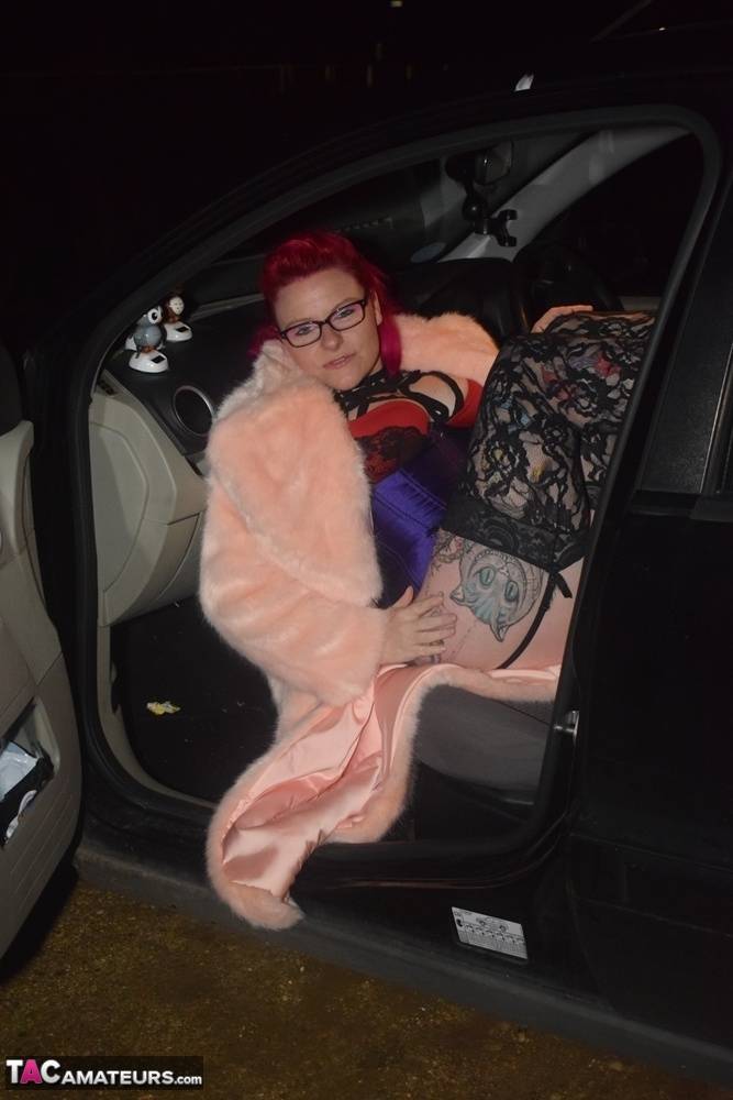 Amateur chick with dyed hair steps out of a vehicle to flash in lingerie - #7