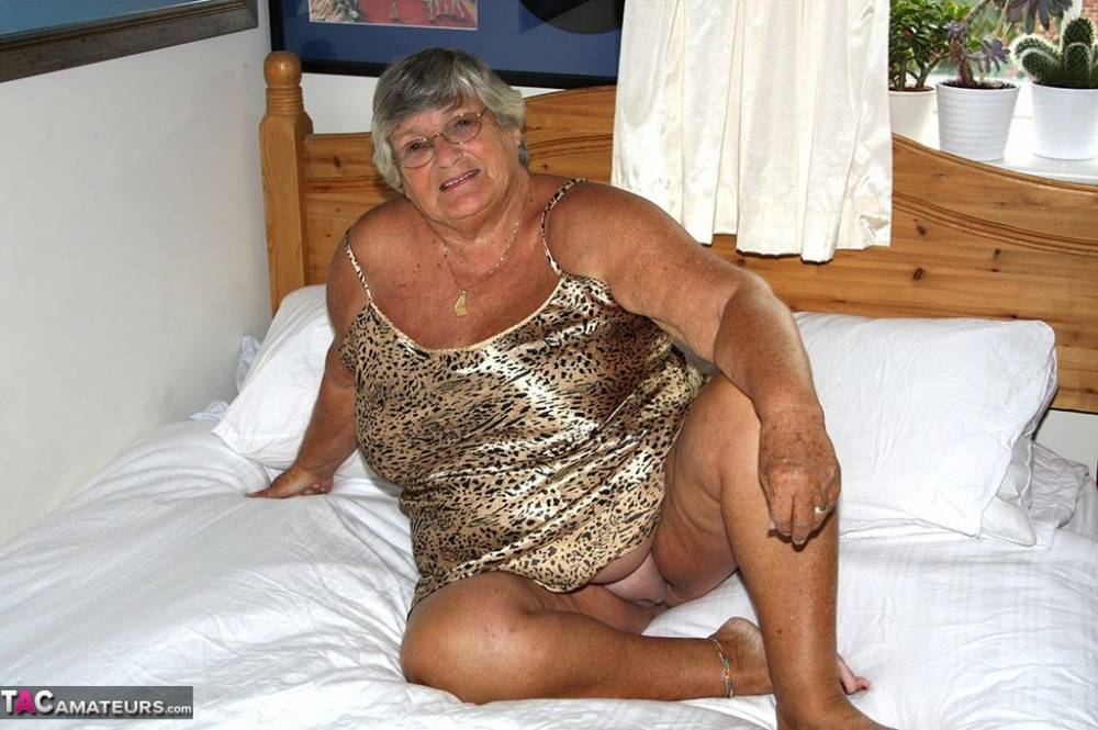 Silver haired senior citizen Grandma Libby masturbates on her bed with a toy - #9