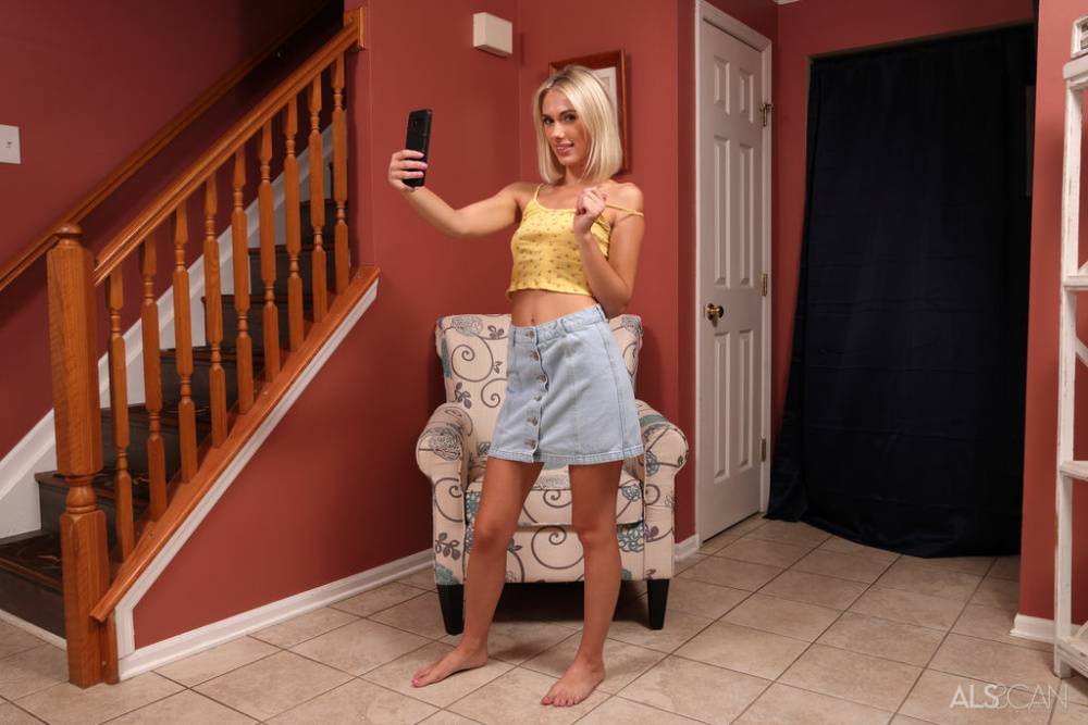 Young blonde Sky Pierce takes some shots before pissing on a floor in the nude - #9