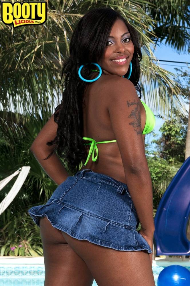 Black girl Pleasure Mia displays her booty before riding a white boy's cock - #4