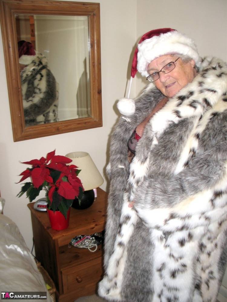 British nan Grandma Libby exposes her fat body in a Christmas hat and hosiery - #2