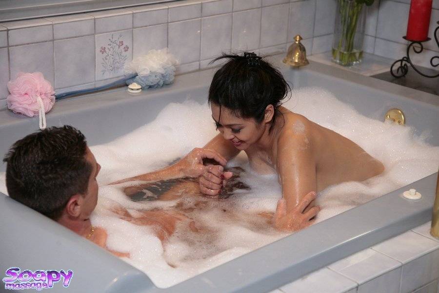 Hot Asian masseuse Mika Tan with big tits giving handjob & footjob in bath - #4