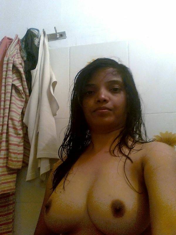 Indian female exposes her big natural tits during candid action at home - #7