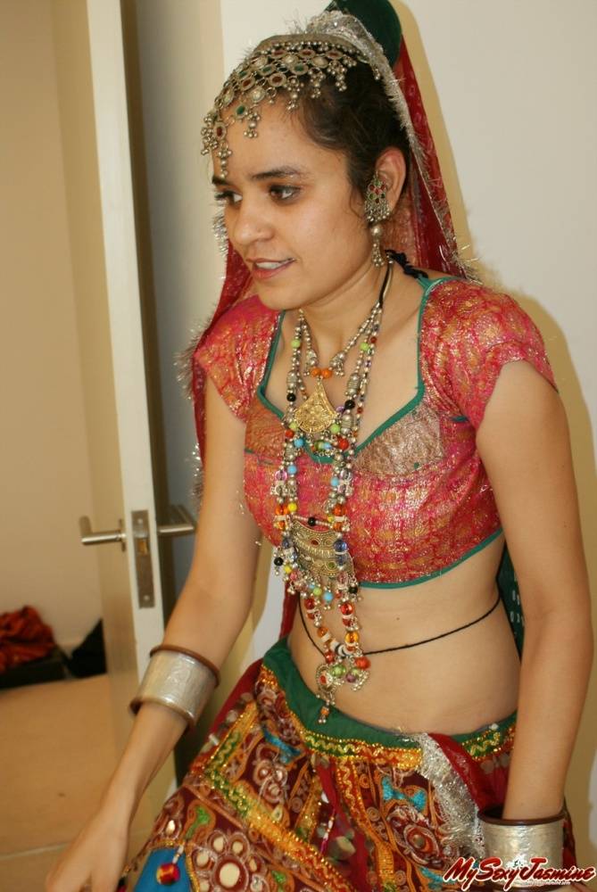 Erotic young Indian removes ethnic clothing to pose topless in cotton panties - #10
