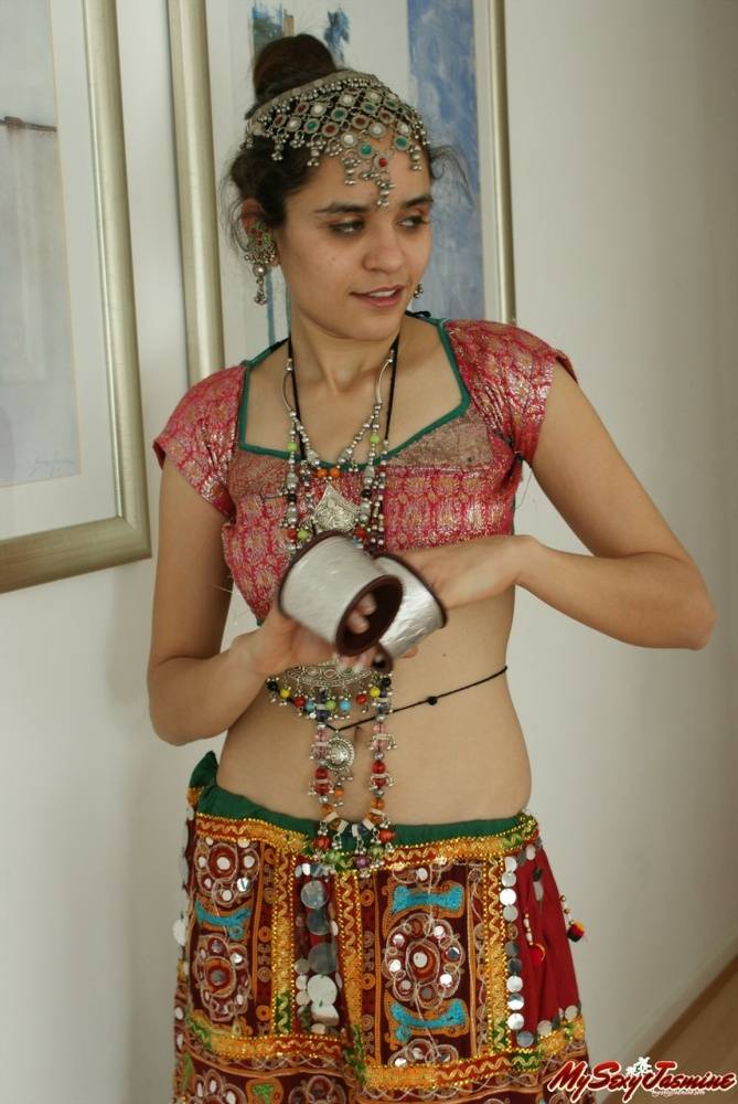 Erotic young Indian removes ethnic clothing to pose topless in cotton panties - #7