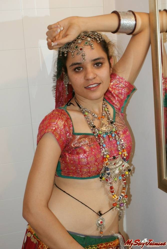 Erotic young Indian removes ethnic clothing to pose topless in cotton panties - #9
