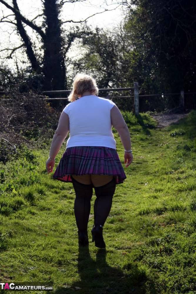 Overweight blonde Lexie Cummings exposes herself by locks on a canal system - #16