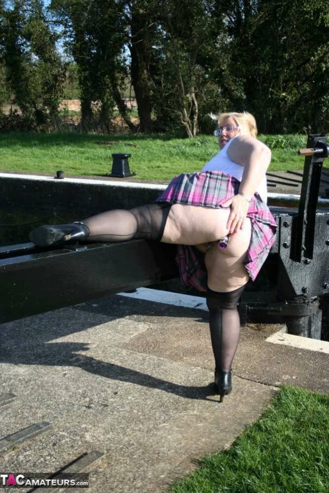 Overweight blonde Lexie Cummings exposes herself by locks on a canal system - #9