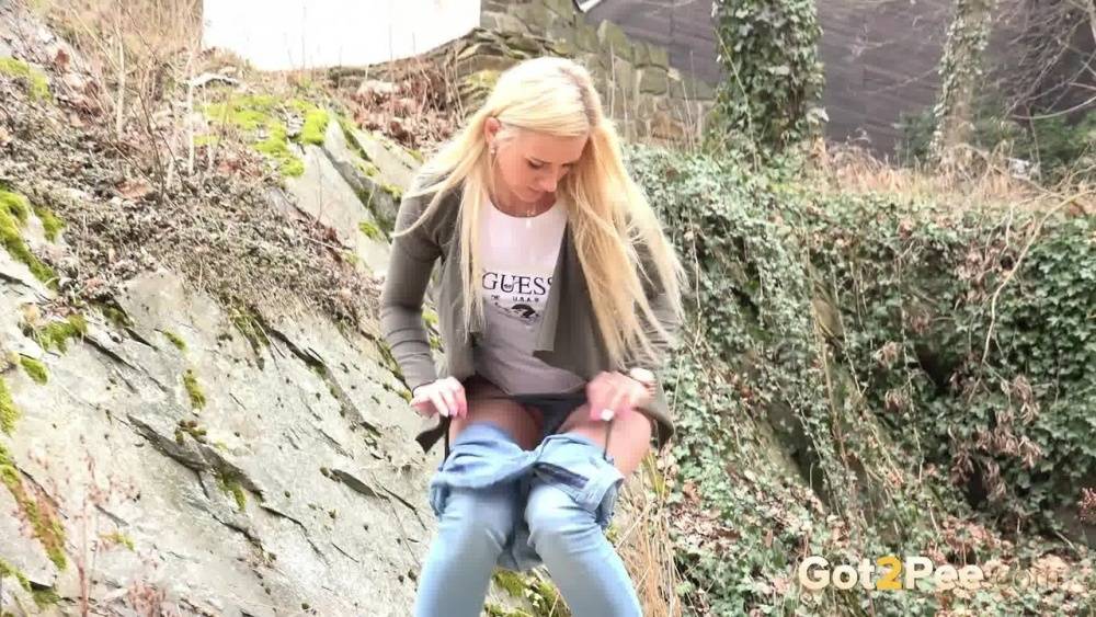 Young girl with long blonde hair Katy Sky pulls down her jeans to pee outside - #15
