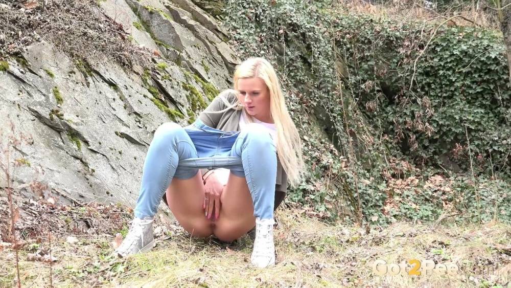 Young girl with long blonde hair Katy Sky pulls down her jeans to pee outside - #11