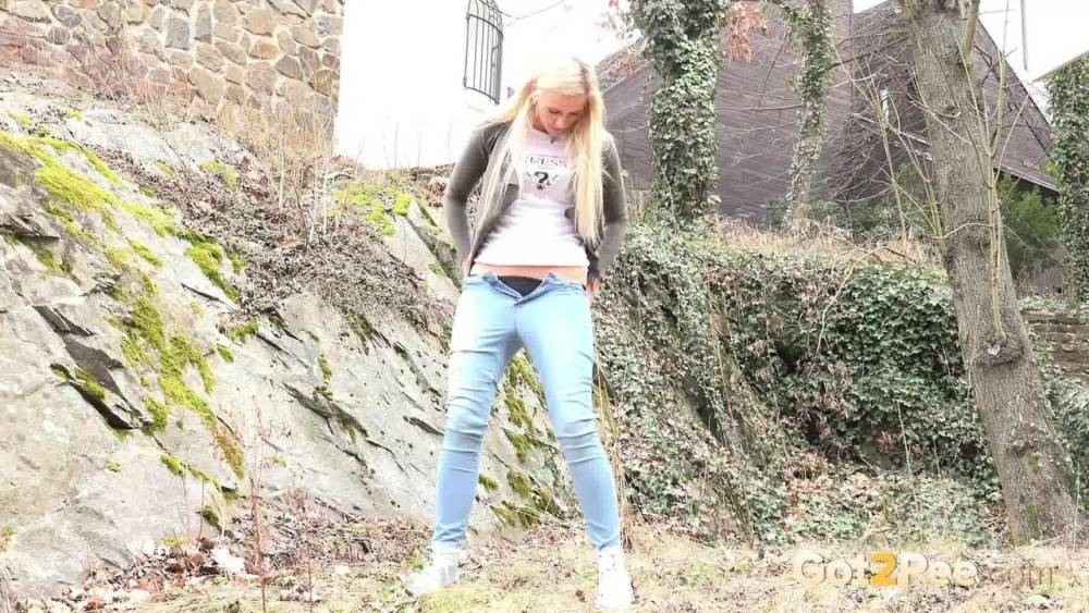 Young girl with long blonde hair Katy Sky pulls down her jeans to pee outside - #4