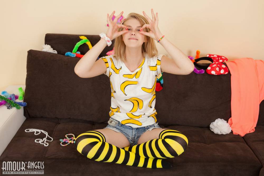 Cute teen Alisha gets naked in striped OTK socks with a big bow in her hair - #13