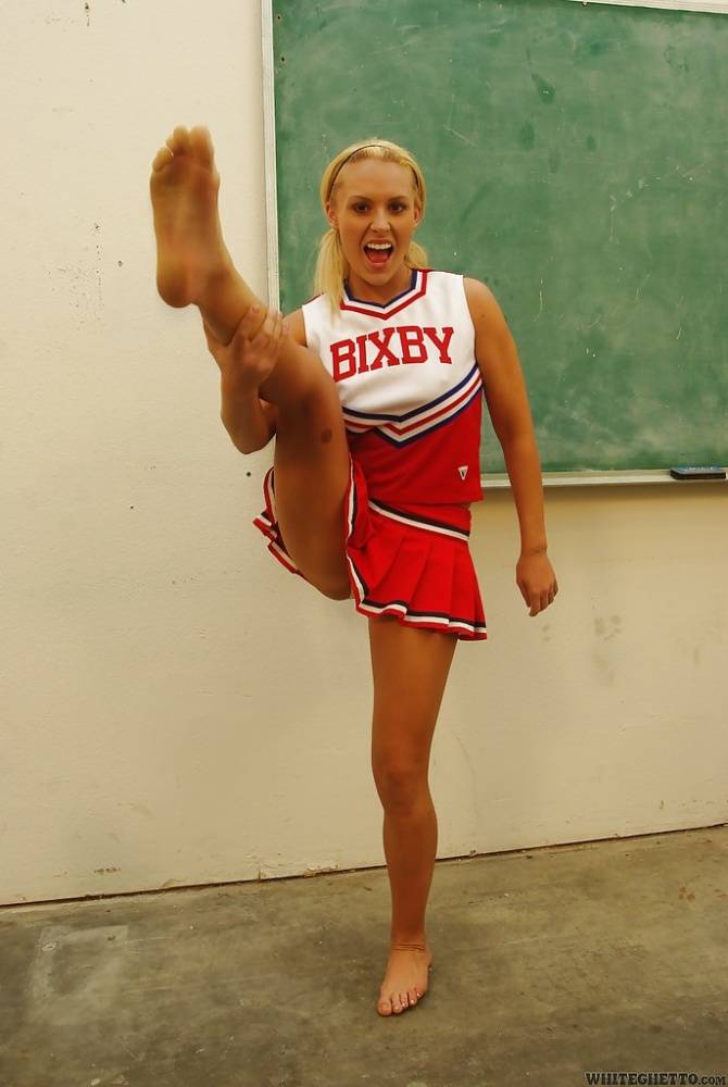 Nasty cheerleader Jamey James stripping and exposing her bare feet - #5