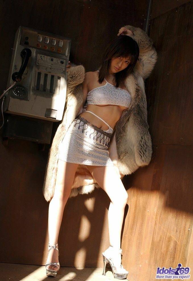 Japanese model Sakura Shiratori thrusts her big tits forward once she's naked - #11