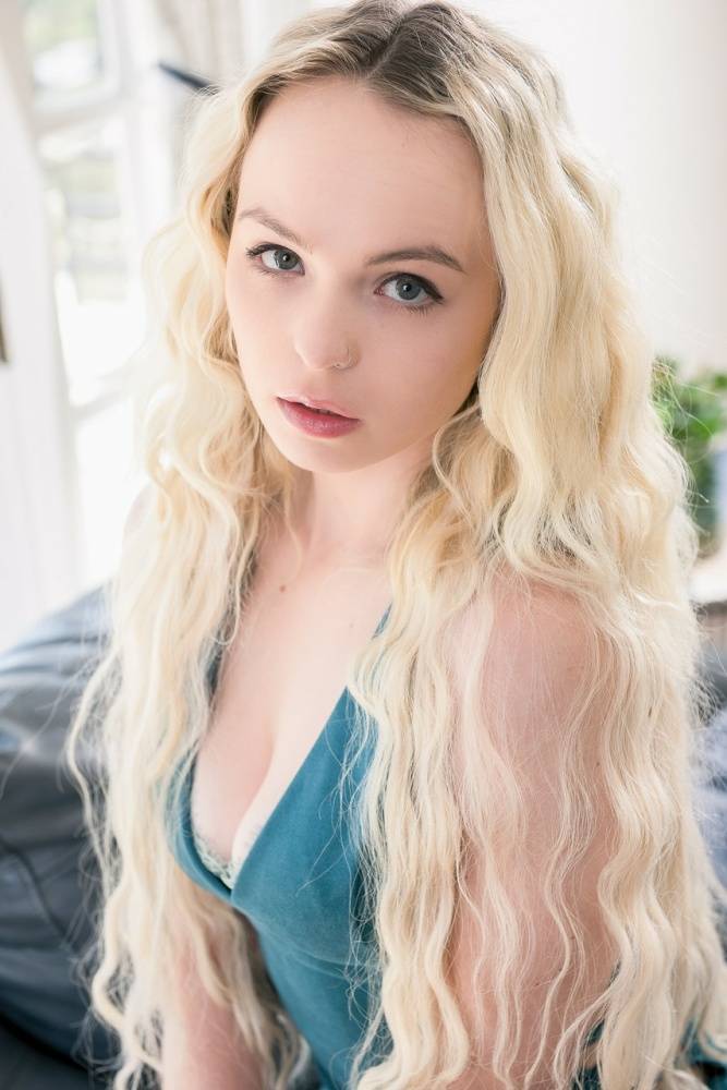 Teen pornstar Lilly Bell plays with her long blonde hair before fucking | Photo: 1290000
