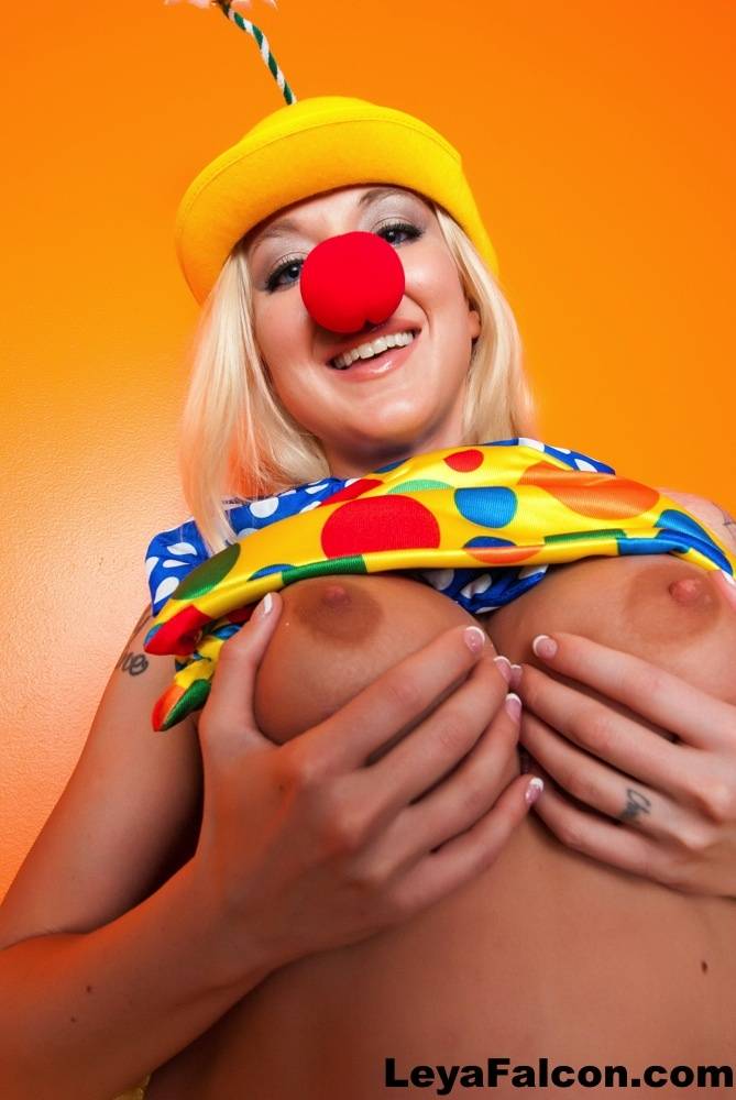 Hot cosplay MILF Leya Falcon in clown costume fondling her huge big tits | Photo: 1328054