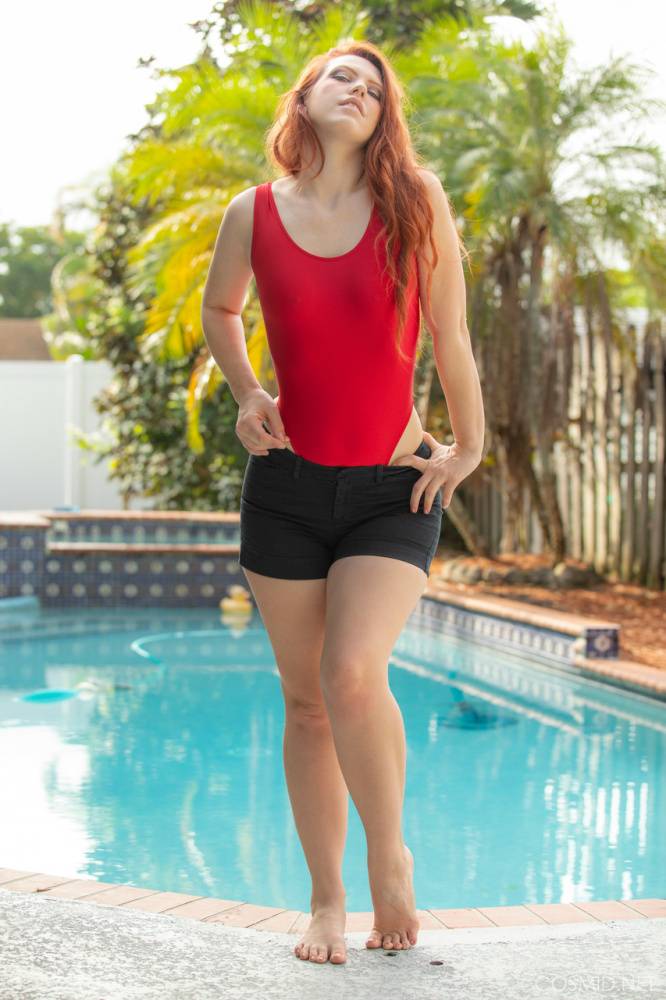 Natural redhead Pepper Gant strips naked in front of a swimming pool - #7