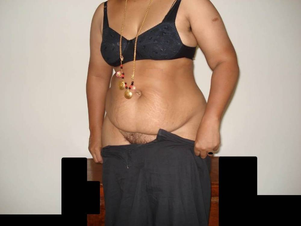 Overweight Indian housewife sports a braided ponytail while getting naked - #4
