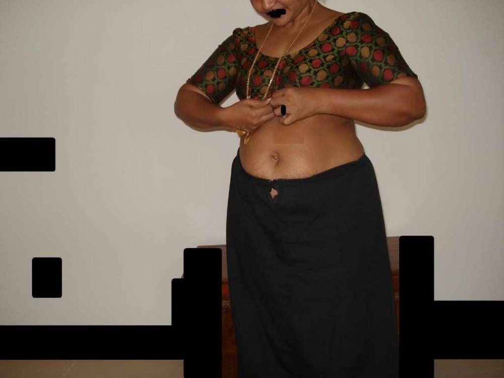 Overweight Indian housewife sports a braided ponytail while getting naked - #7