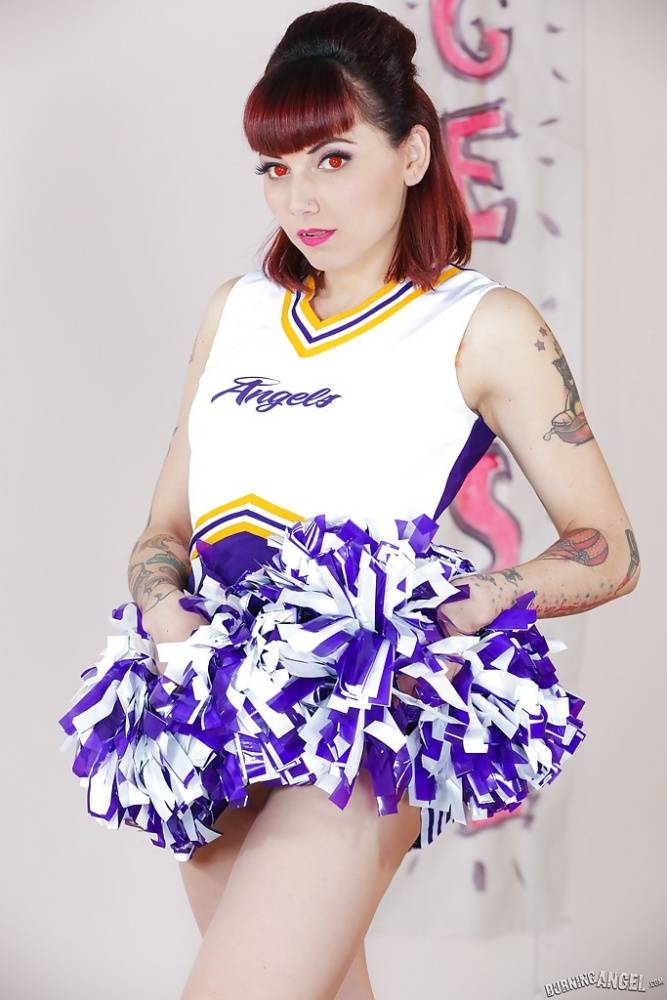 Tattooed schoolgirl cheerleader undresses for bald cunt spreading | Photo: 1362663