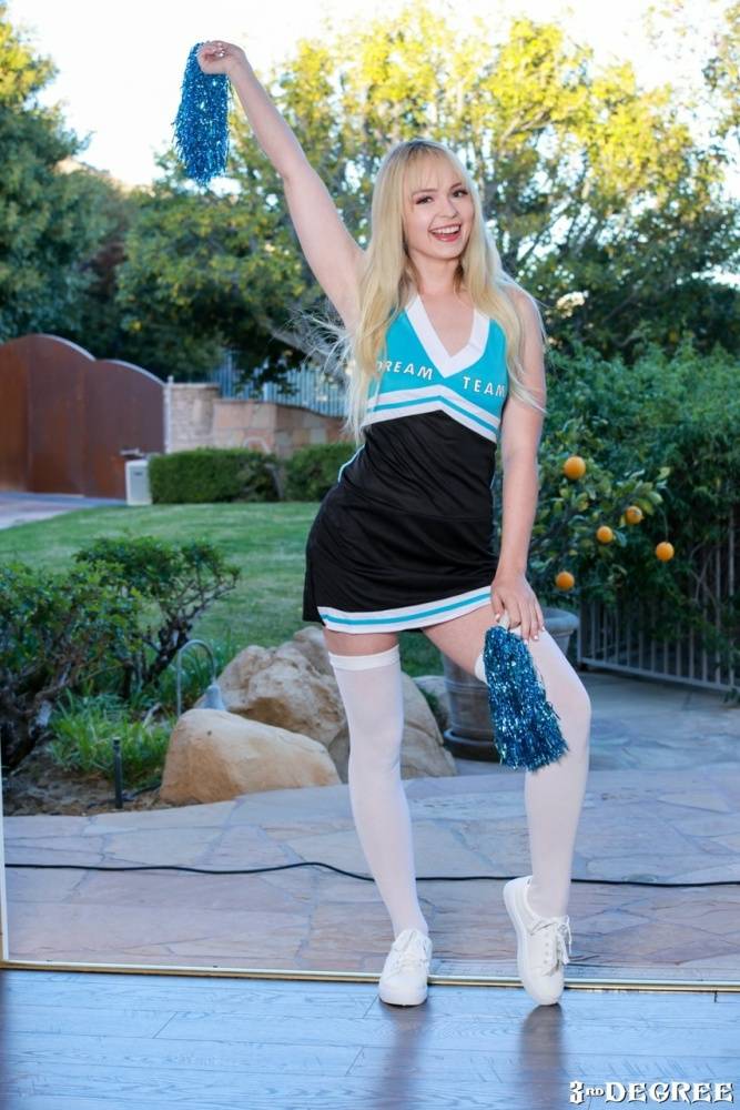 Blonde cheerleader Lilly Bell strips to white stockings before interracial sex - #15